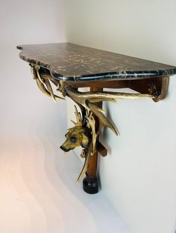 A Black Forest antlers console. 