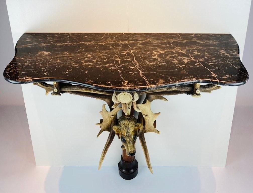 A Black Forest antlers console. 