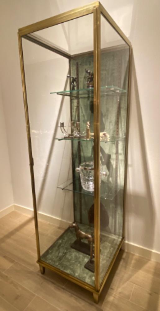 A brass vitrine / display cabinet