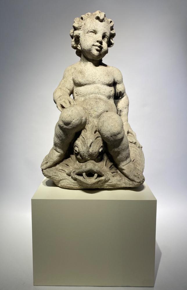 A Carved sandstone putto /fountain. 