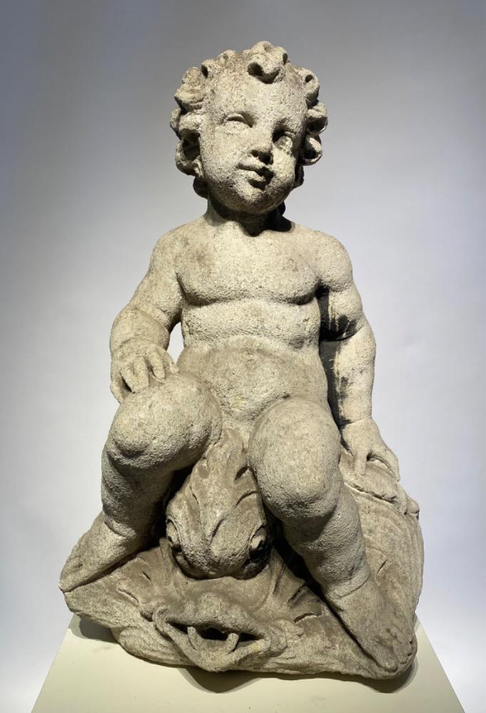 A Carved sandstone putto /fountain. 