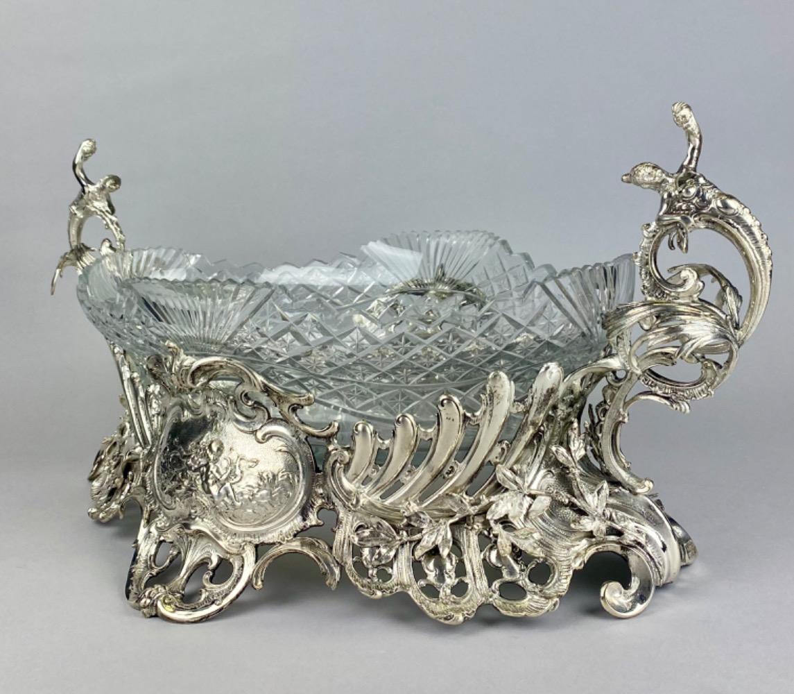 A large late 19thC silver plated jardinière