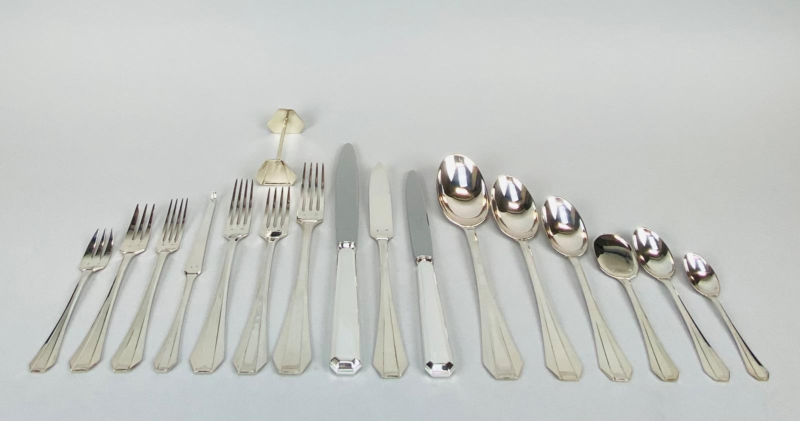 A superb Art Deco Cutlery Set For 12, Solid Silver, 222 Pieces, Complete In Its cabinet. By Delheid Frères Brussels, Model 