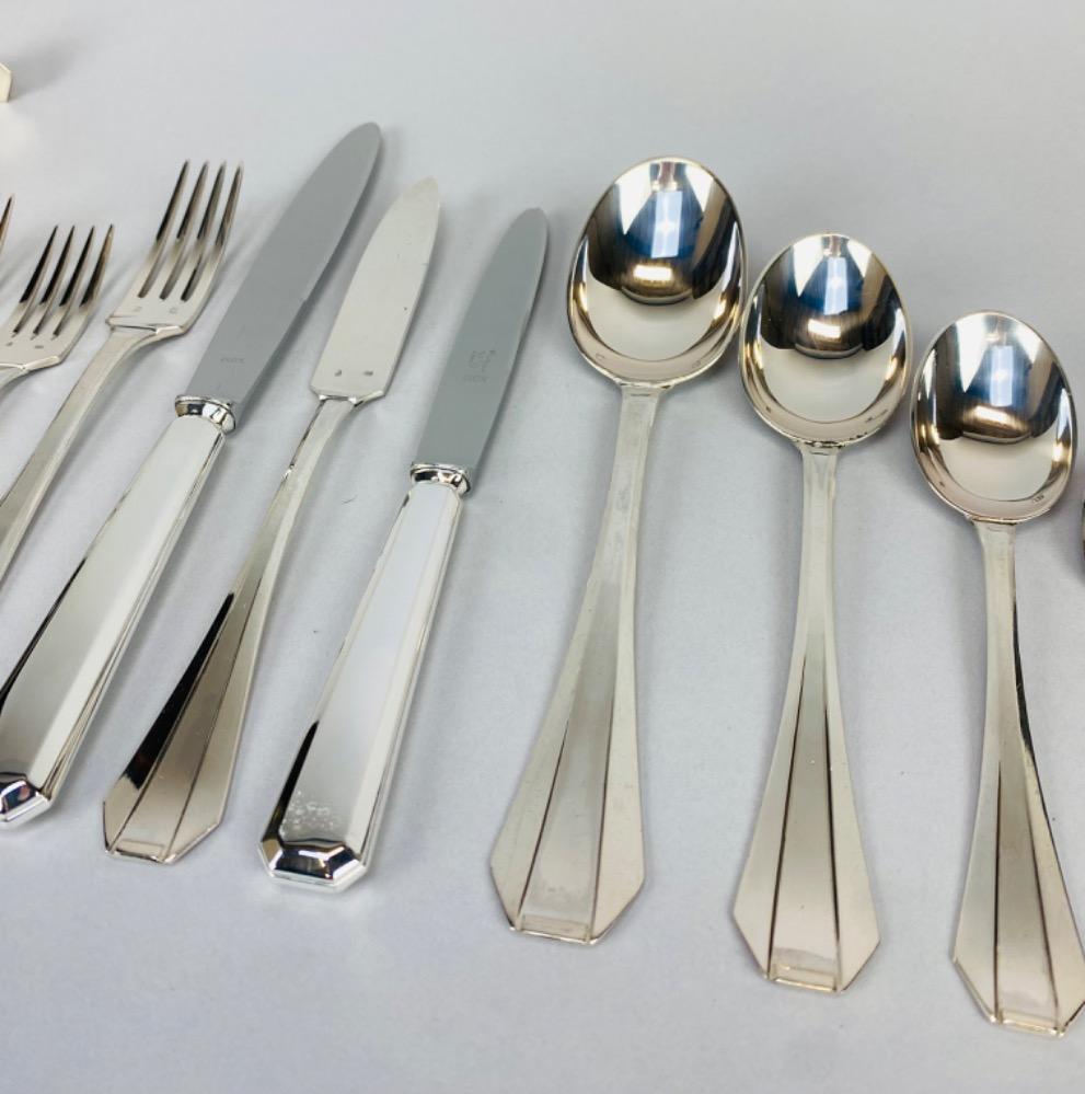 A superb Art Deco Cutlery Set For 12, Solid Silver, 222 Pieces, Complete In Its cabinet. By Delheid Frères Brussels, Model 