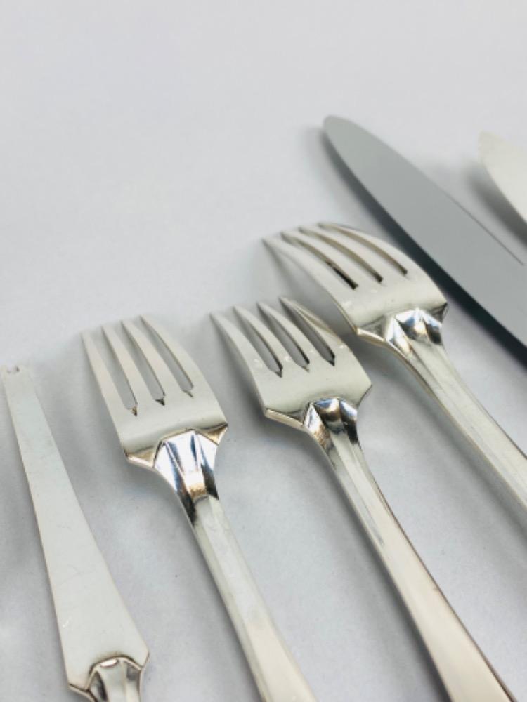 A superb Art Deco Cutlery Set For 12, Solid Silver, 222 Pieces, Complete In Its cabinet. By Delheid Frères Brussels, Model 