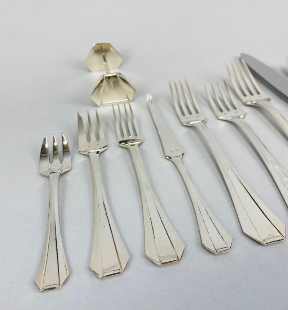 A superb Art Deco Cutlery Set For 12, Solid Silver, 222 Pieces, Complete In Its cabinet. By Delheid Frères Brussels, Model 