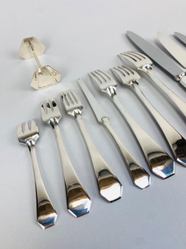 A superb Art Deco Cutlery Set For 12, Solid Silver, 222 Pieces, Complete In Its cabinet. By Delheid Frères Brussels, Model 