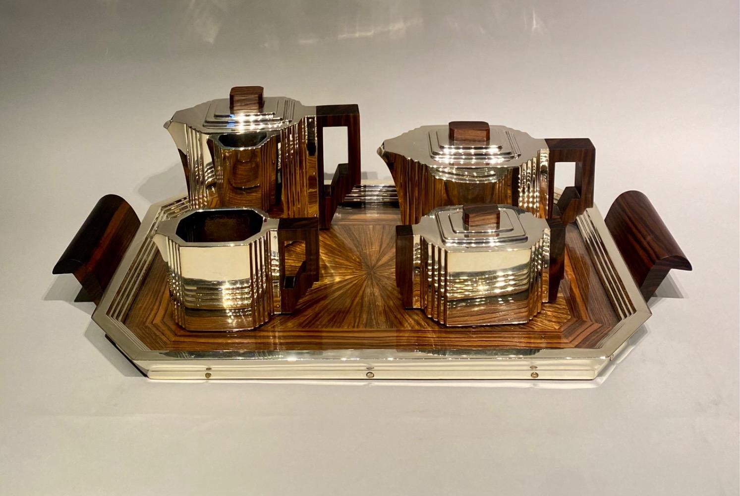 An Art Deco solid silver coffee and tea service by Delheid Frères Brussels.