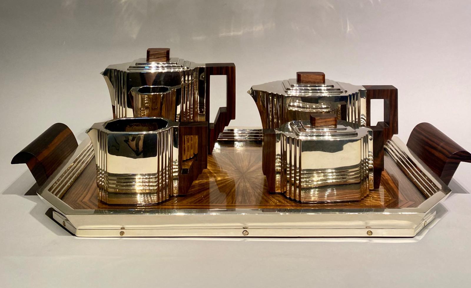 An Art Deco solid silver coffee and tea service by Delheid Frères Brussels.