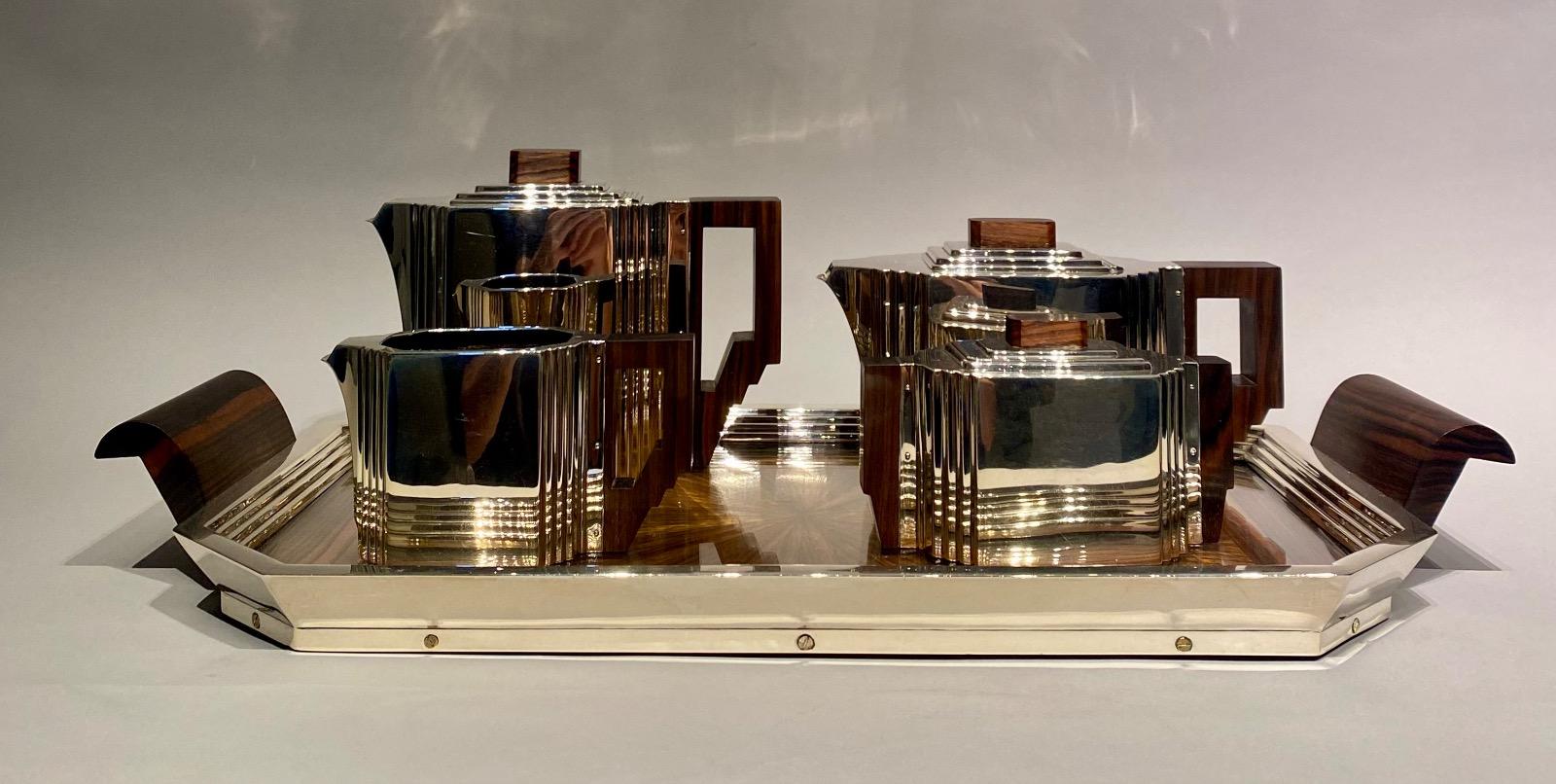 An Art Deco solid silver coffee and tea service by Delheid Frères Brussels.