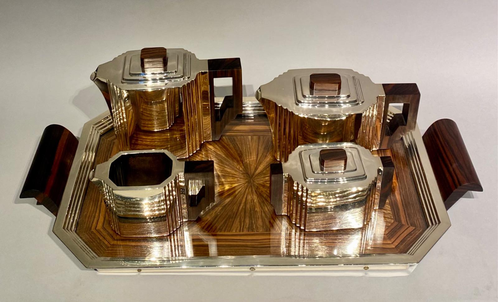 An Art Deco solid silver coffee and tea service by Delheid Frères Brussels.