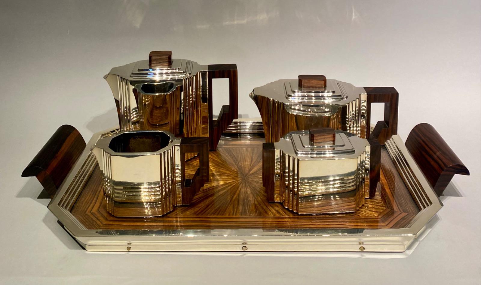 An Art Deco solid silver coffee and tea service by Delheid Frères Brussels.