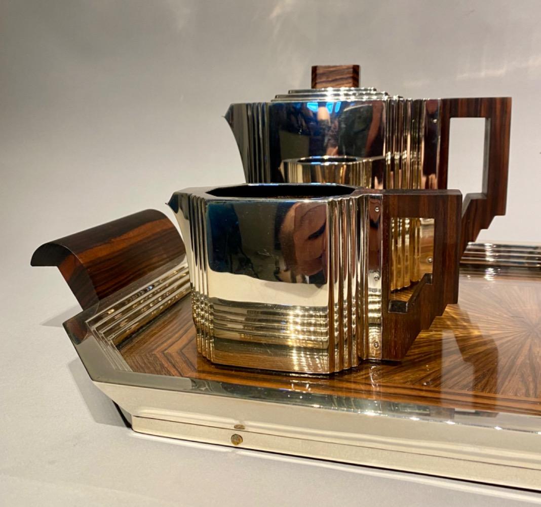 An Art Deco solid silver coffee and tea service by Delheid Frères Brussels.