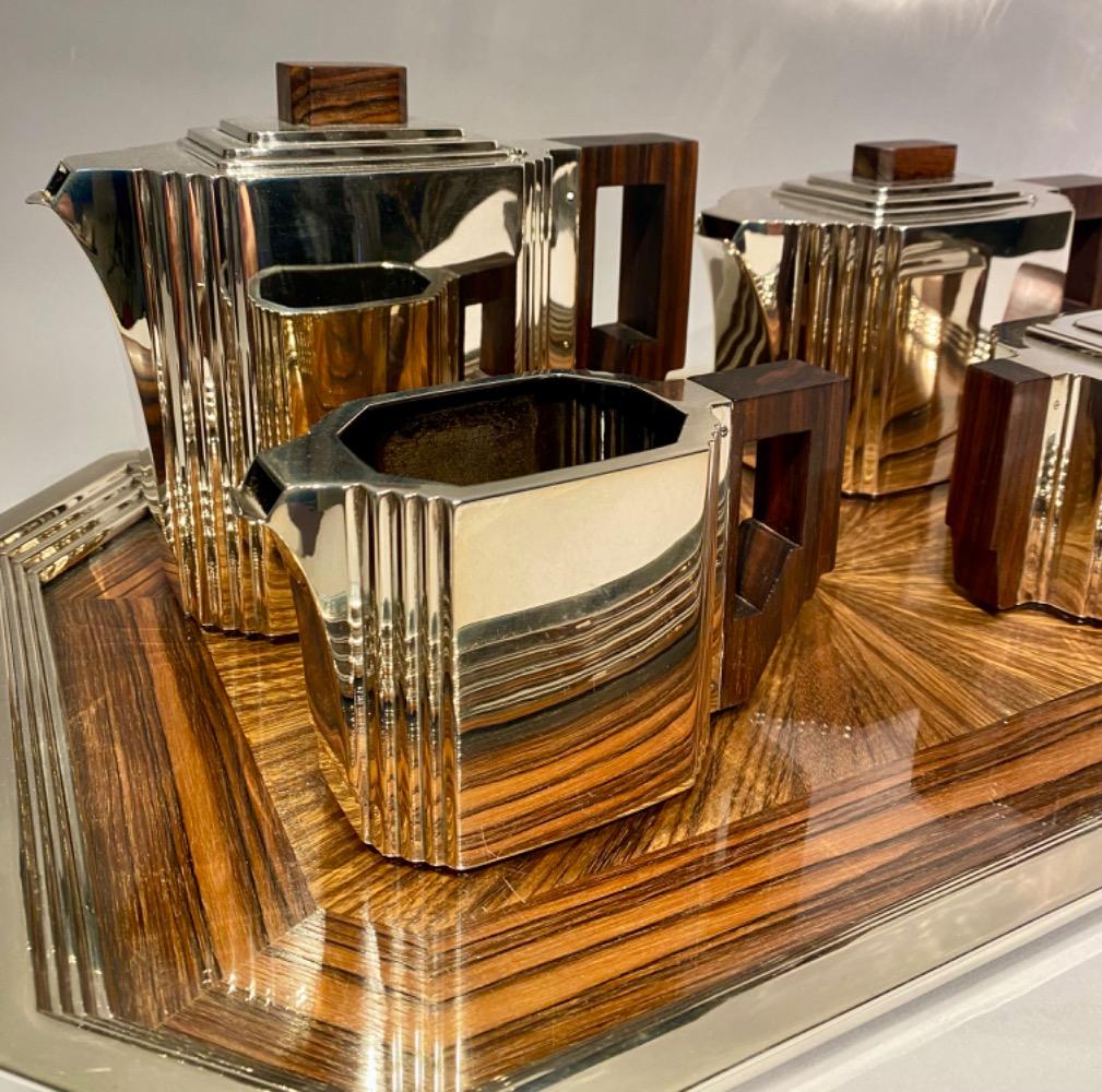 An Art Deco solid silver coffee and tea service by Delheid Frères Brussels.