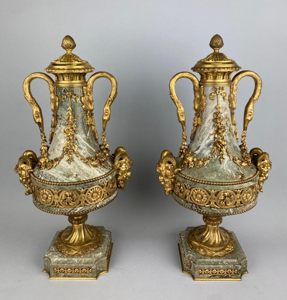 Pair 19th century Louis XVI style marble urns. 