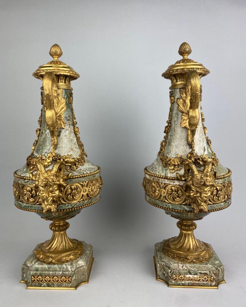 Pair 19th century Louis XVI style marble urns. 